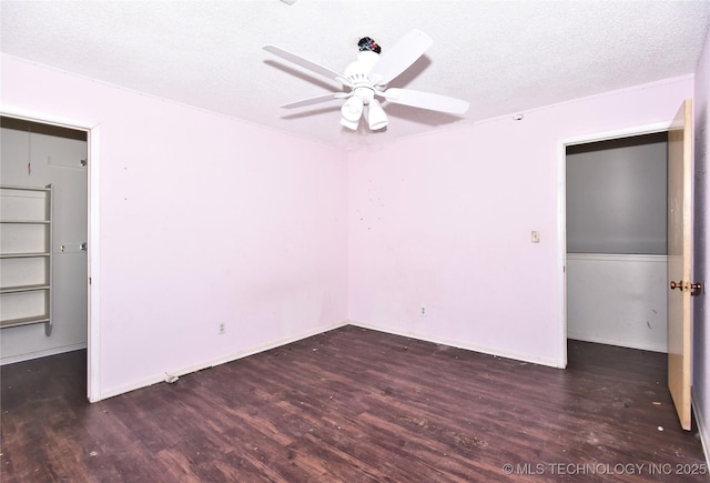6903 E 63rd St, Tulsa, OK 74133 - unfurnished bedroom featuring wood finished floors, a textured ceiling, ceiling fan, and baseboards