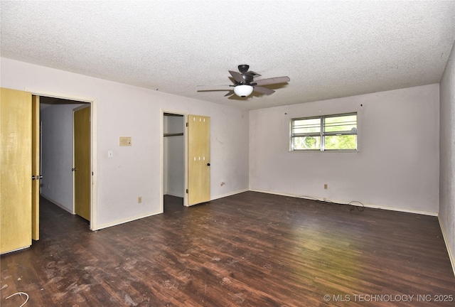 6903 E 63rd St, Tulsa, OK 74133 - empty room with a textured ceiling, wood finished floors, ceiling fan, and baseboards
