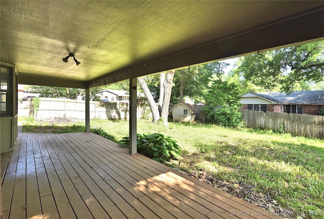 6903 E 63rd St, Tulsa, OK 74133 - deck with a storage shed and an outdoor structure