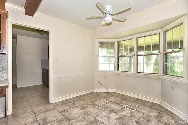 6903 E 63rd St, Tulsa, OK 74133 - unfurnished room with crown molding, a ceiling fan, and baseboards