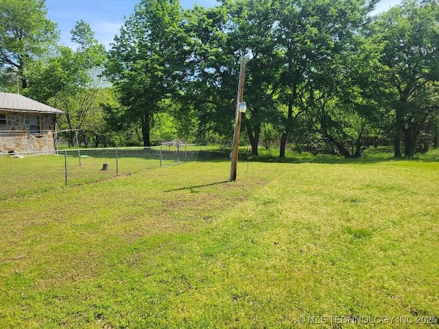 view of yard featuring fence