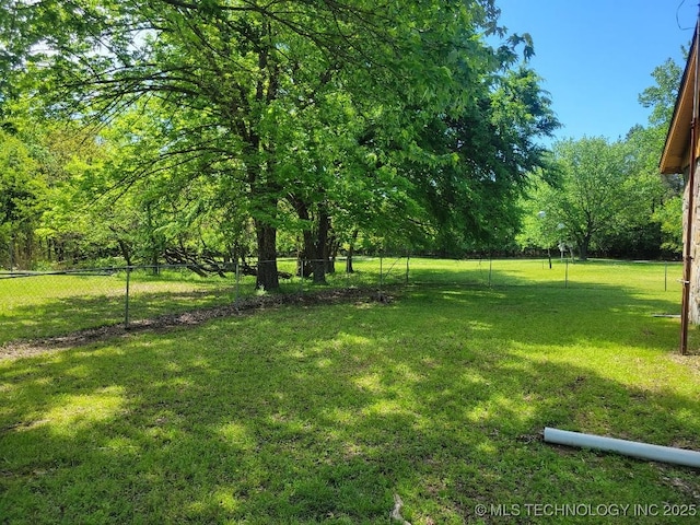 view of yard featuring fence