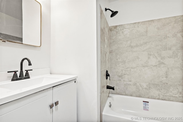 full bath with vanity and bathing tub / shower combination