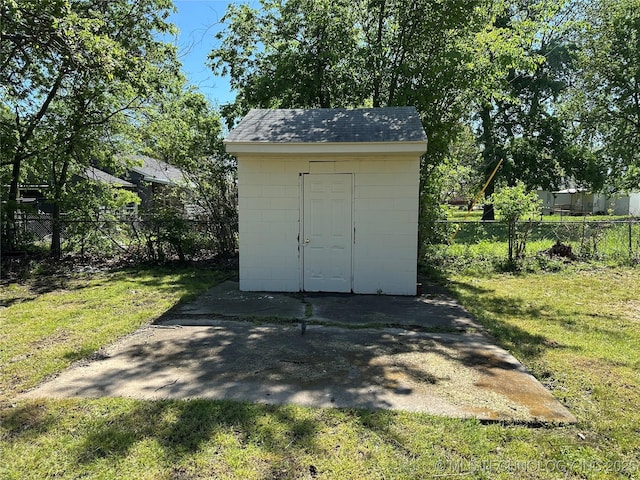 view of shed featuring a fenced backyard