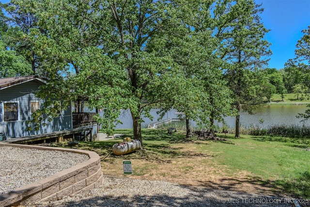 view of yard with a water view
