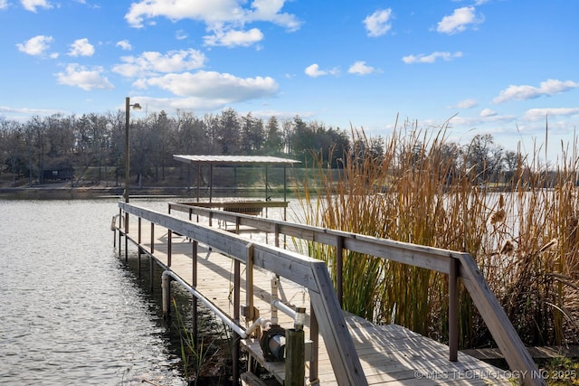 view of dock featuring a water view