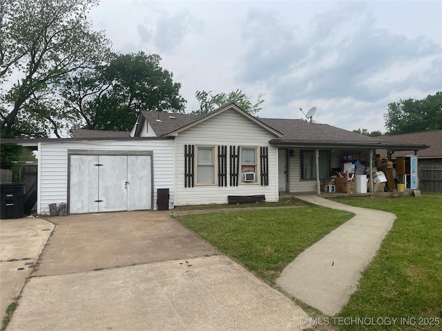 single story home with driveway, a shingled roof, a front lawn, and fence