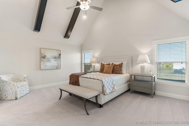 bedroom with baseboards, a ceiling fan, high vaulted ceiling, and light carpet