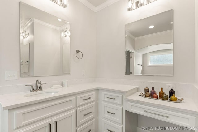 bathroom with recessed lighting, vanity, and ornamental molding