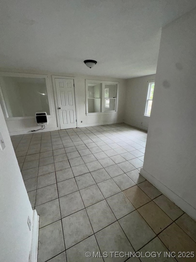 interior space featuring light tile patterned flooring