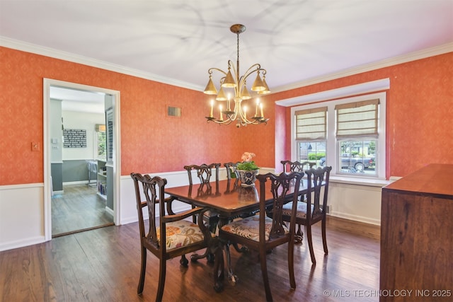 2412 E 23rd St, Tulsa, OK 74114 - dining space featuring visible vents, dark wood-style flooring, an inviting chandelier, and a healthy amount of sunlight