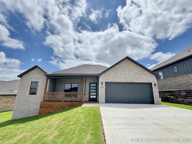 574 Woodlands Dr, Tahlequah, OK 74464 - view of front of property with an attached garage, brick siding, and driveway