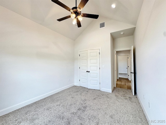 574 Woodlands Dr, Tahlequah, OK 74464 - unfurnished bedroom with carpet flooring, baseboards, high vaulted ceiling, a closet, and recessed lighting