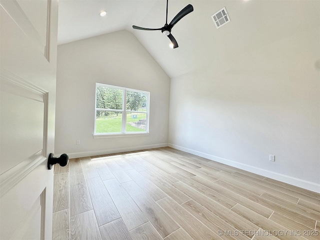574 Woodlands Dr, Tahlequah, OK 74464 - spare room with a ceiling fan, light wood-style floors, vaulted ceiling, and baseboards