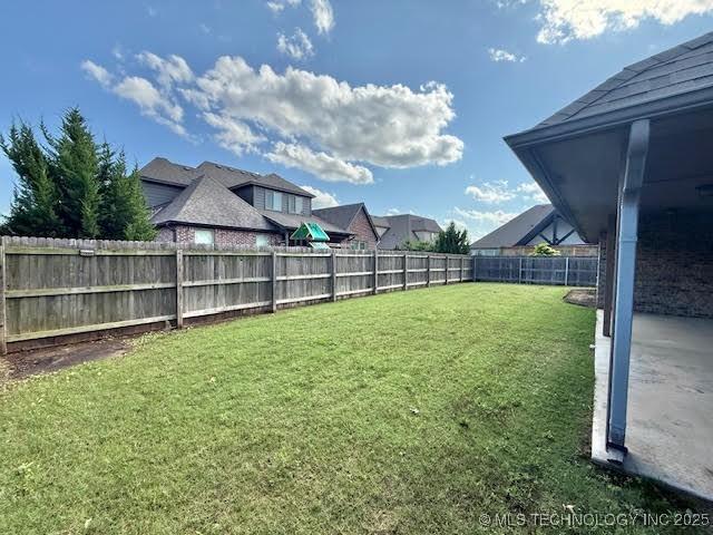 7056 E 124th St S, Bixby, OK 74008 - view of yard with a residential view