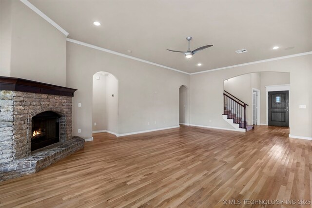 7056 E 124th St S, Bixby, OK 74008 - unfurnished living room with light wood-style floors, crown molding, baseboards, recessed lighting, and a ceiling fan