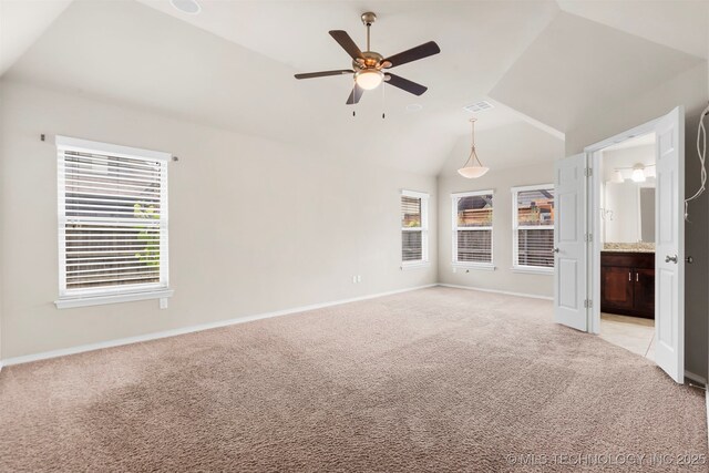 7056 E 124th St S, Bixby, OK 74008 - empty room featuring light colored carpet, a ceiling fan, lofted ceiling, and baseboards