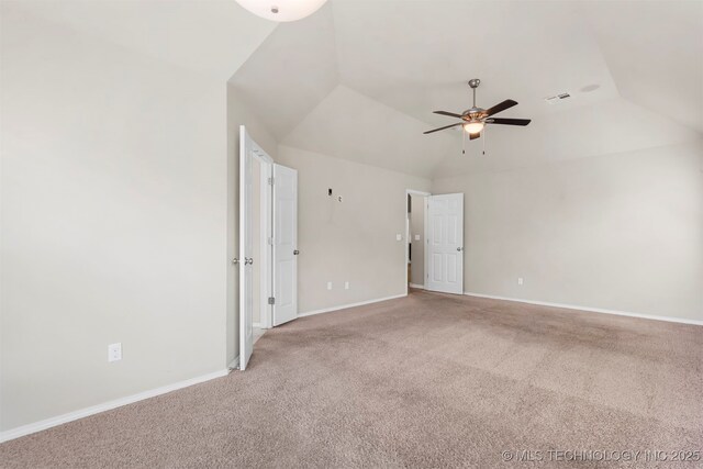 7056 E 124th St S, Bixby, OK 74008 - spare room with lofted ceiling, ceiling fan, light colored carpet, and baseboards