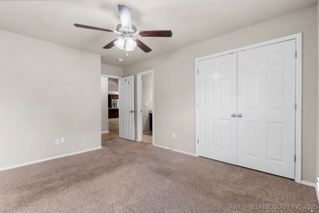 7056 E 124th St S, Bixby, OK 74008 - unfurnished bedroom with carpet flooring, baseboards, a closet, and ceiling fan