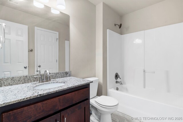 7056 E 124th St S, Bixby, OK 74008 - full bath with toilet, vanity, washtub / shower combination, and tile patterned flooring