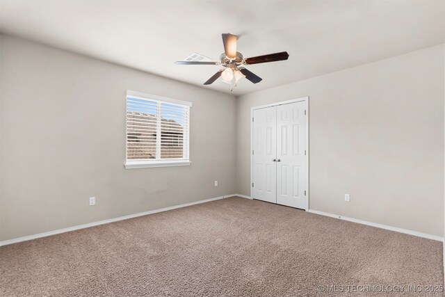 7056 E 124th St S, Bixby, OK 74008 - unfurnished bedroom with carpet floors, baseboards, a closet, and a ceiling fan