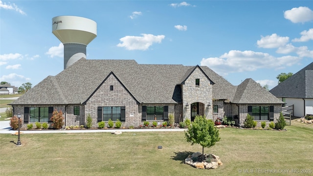 19340 E Canyon Ridge Rd, Owasso, OK 74055 - view of front facade featuring a front lawn, brick siding, and a shingled roof