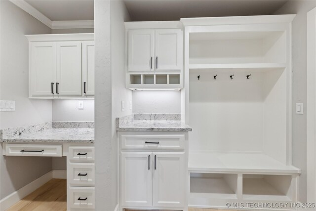 19340 E Canyon Ridge Rd, Owasso, OK 74055 - mudroom with crown molding and light wood-style floors