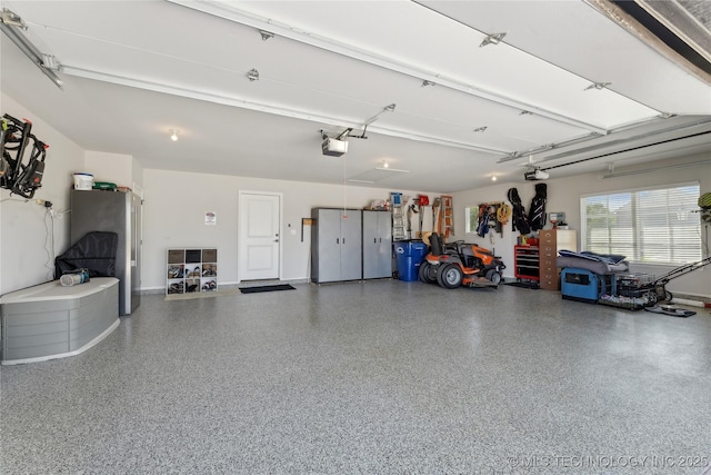 19340 E Canyon Ridge Rd, Owasso, OK 74055 - garage featuring a garage door opener
