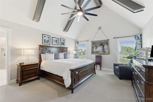19340 E Canyon Ridge Rd, Owasso, OK 74055 - bedroom with light colored carpet, baseboards, multiple windows, and high vaulted ceiling