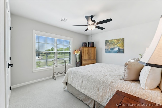 19340 E Canyon Ridge Rd, Owasso, OK 74055 - carpeted bedroom with visible vents, a ceiling fan, and baseboards