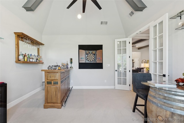 19340 E Canyon Ridge Rd, Owasso, OK 74055 - interior space featuring baseboards, a ceiling fan, high vaulted ceiling, and a bar