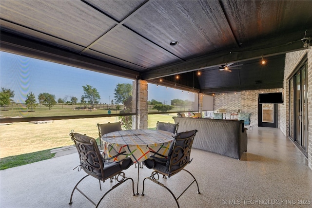 19340 E Canyon Ridge Rd, Owasso, OK 74055 - view of patio / terrace with outdoor dining area and ceiling fan