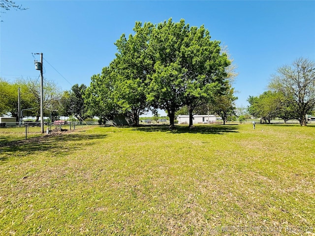 view of yard with fence