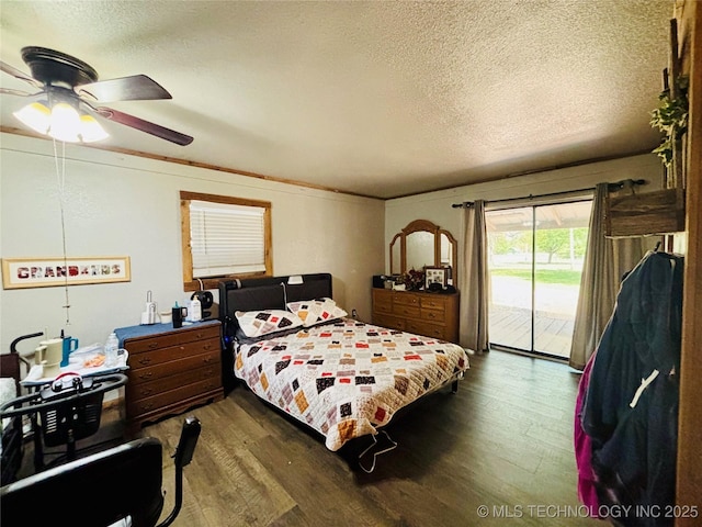 bedroom with wood finished floors, a textured ceiling, ceiling fan, and access to exterior