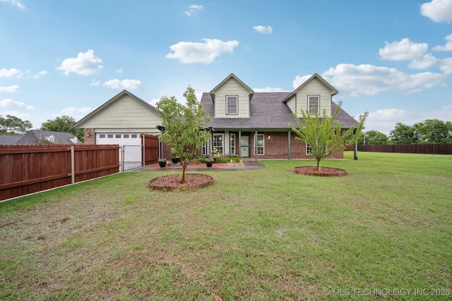 view of front of home with fence, a front yard, brick siding, a gate, and a shingled roof