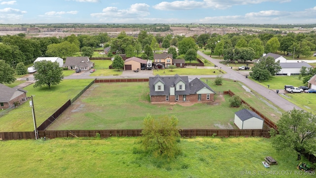 15015 E 74th Pl, Owasso, OK 74055 - aerial view of residential area featuring a tree filled landscape