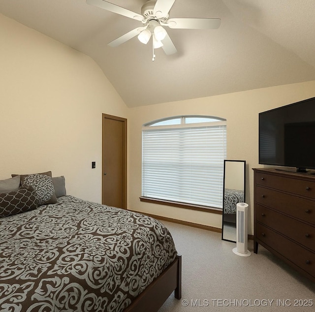 3701 Bridgeport Rd, Norman, OK 73072 - carpeted bedroom featuring lofted ceiling and a ceiling fan