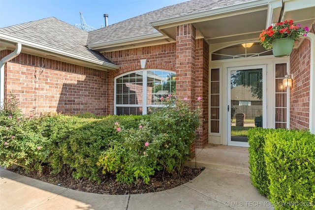 3701 Bridgeport Rd, Norman, OK 73072 - entrance to property featuring brick siding and a shingled roof