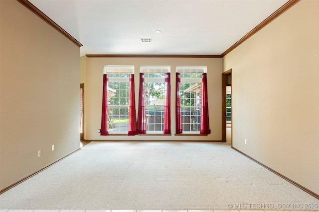 3701 Bridgeport Rd, Norman, OK 73072 - spare room featuring crown molding and carpet