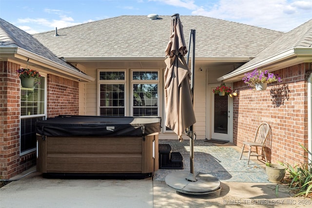 3701 Bridgeport Rd, Norman, OK 73072 - view of patio / terrace featuring a hot tub