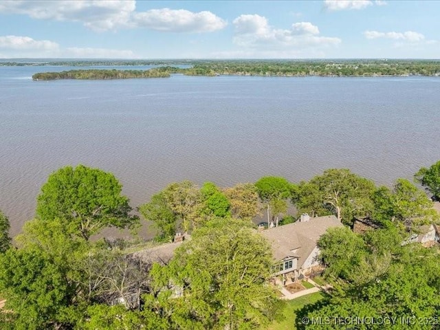 drone / aerial view with a water view