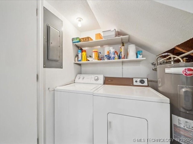 laundry area featuring laundry area, washing machine and dryer, electric panel, a textured ceiling, and electric water heater