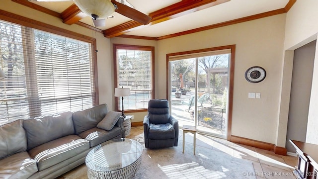 living room with baseboards, ornamental molding, beam ceiling, and light tile patterned flooring