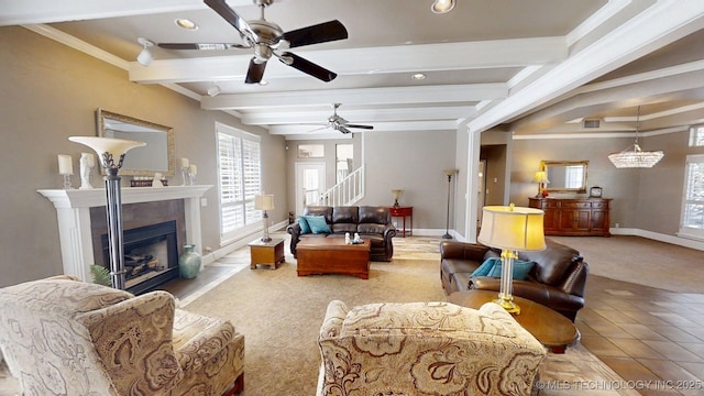 carpeted living area with beamed ceiling, baseboards, stairway, recessed lighting, and a ceiling fan