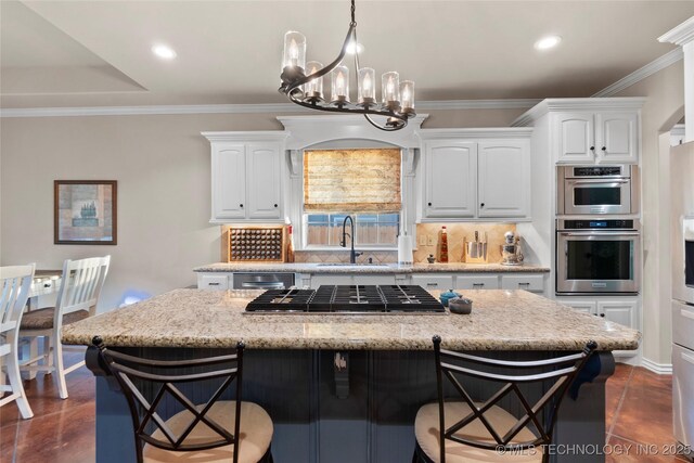 12330 S Ash Ave, Jenks, OK 74037 - kitchen with a sink, appliances with stainless steel finishes, a breakfast bar, backsplash, and ornamental molding