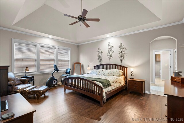 12330 S Ash Ave, Jenks, OK 74037 - bedroom featuring a tray ceiling, dark wood-style floors, arched walkways, recessed lighting, and a ceiling fan