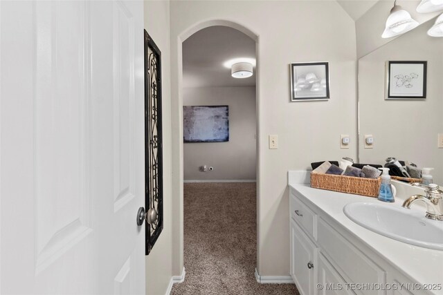 12330 S Ash Ave, Jenks, OK 74037 - bathroom with vanity and baseboards