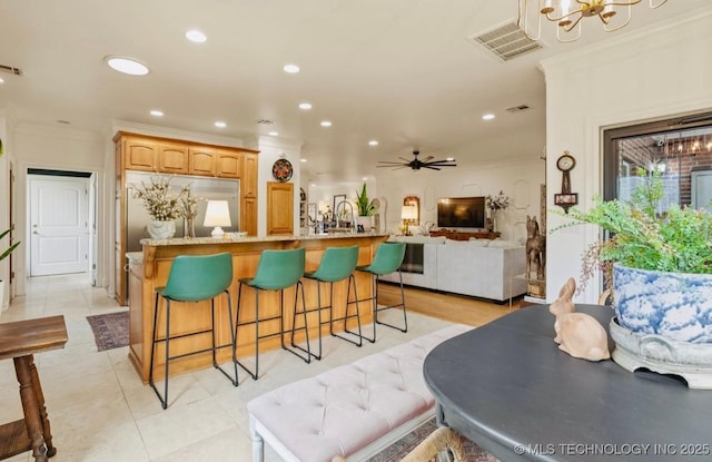 461 Cross Timbers Blvd, Sapulpa, OK 74066 - interior space featuring visible vents, refrigerator, crown molding, and recessed lighting