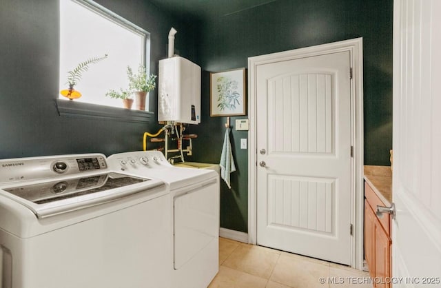 461 Cross Timbers Blvd, Sapulpa, OK 74066 - clothes washing area with light tile patterned floors, water heater, laundry area, and independent washer and dryer