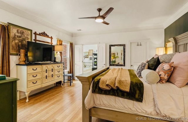 461 Cross Timbers Blvd, Sapulpa, OK 74066 - bedroom with ornamental molding, a ceiling fan, and light wood-style floors